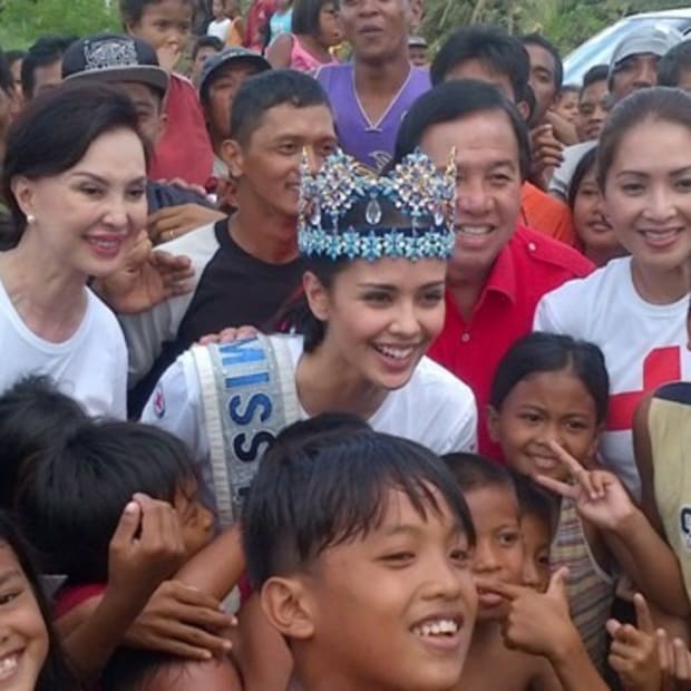 Miss World Volunteers with the Red Cross .....cover