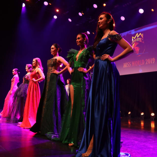 Contestants sparkle in their World Designer gowns cover