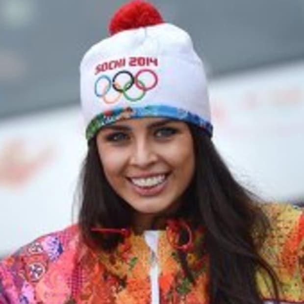 Miss Russia carries Olympic Torch on road to Sochi COVER